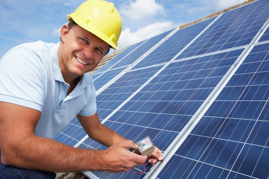 Smiling Man installing Solar Solar Panel Systems NZ